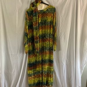 Long sleeve, long dress with scarf.